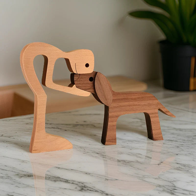 Paws of love - hond en man handgemaakte houten sculptuur - symbool voor eeuwige band